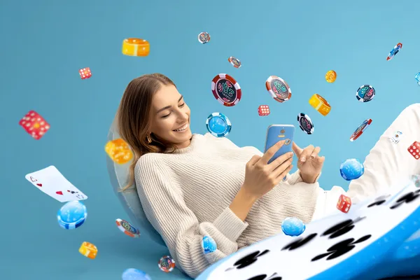 A woman in a luxurious green gown next to an ornate roulette wheel, capturing the upscale casino mood of KOKOZINO.